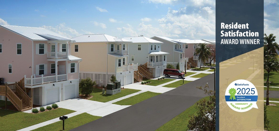 A residential area with a sign indicating it is a resident satisfaction award winner.